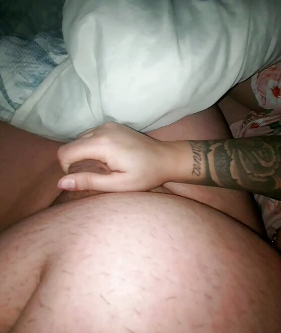 Tattooed step mom handjob step son dick in bed